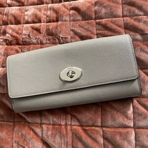 Coach turnlock leather wallet